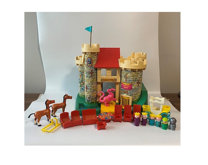 1974 Fisher Price Play Family Castle Model #993 with original accessories incuding carriage, dragon, king, queen, knight, woodsman etc.