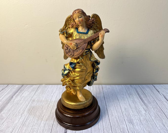 Musical ceramic angel playing a Mandolin Music Box - Rotates and Plays "Silent Night" made in Italy