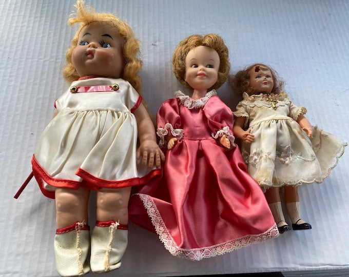 Set of 3 vintage dolls - Rubber Majorette Doll, 1963 Deluxe Reading Corp Doll, and jointed plastic doll