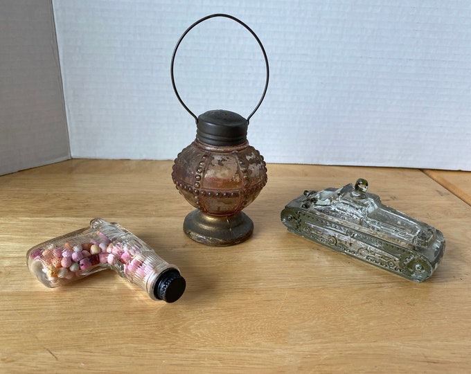Set of 2 Early 1900s Candy Dispensers of army tank, pistol  (lantern is sold)