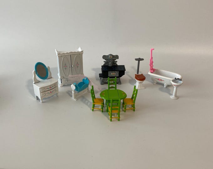 12 Piece Little Kiddles Family die cast metal furniture from 1980 includes, table, chairs, stove, bedroom and bathroom sets
