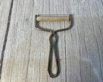 Vintage Cheese Slicer with wooden roller