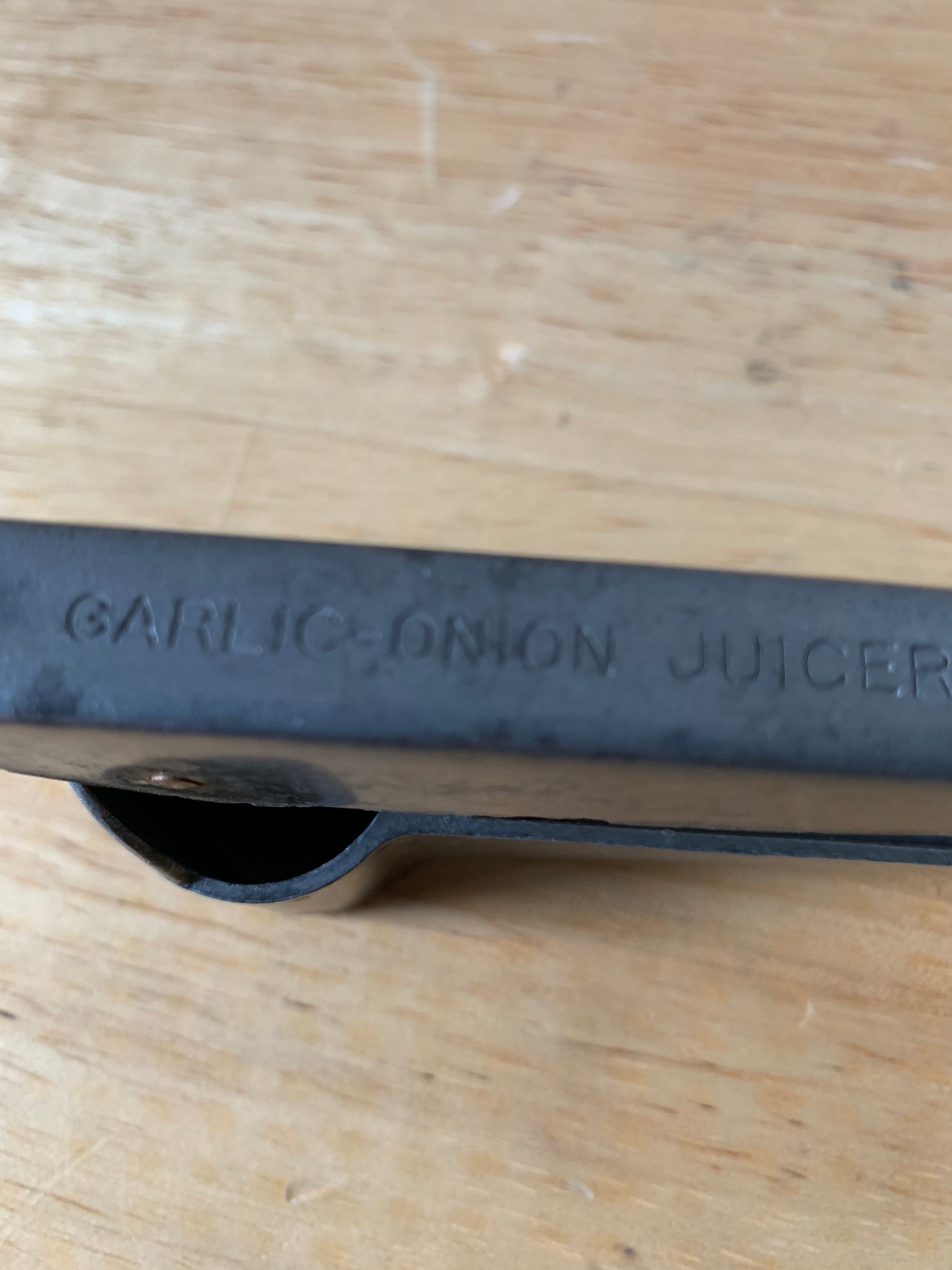 Vintage garlic press onion juicer from Ecko