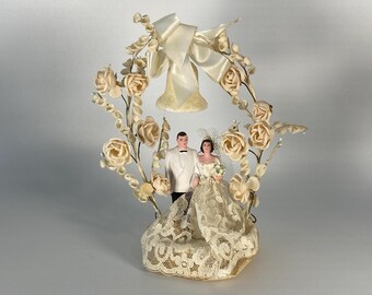 Romantic Vintage Hobard Cake Ornament Company Plaster Bride and Groom Cake Topper with rose and floral arch topped with Sugar Bell
