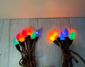 Choice of vintage C 9 end to end no name 7 string multi color swirl and fluted Christmas lights