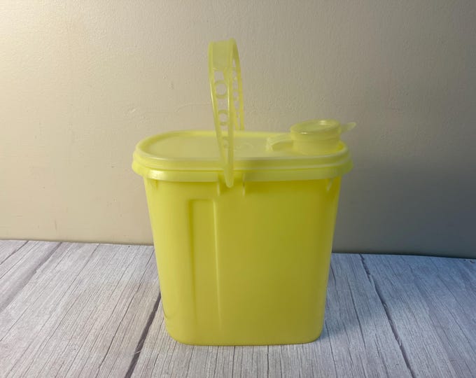 Tupperware yellow pitcher with handle
