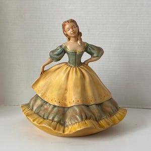 1961 Vintage MCM Large Peasant  Lady Ceramic Figurine in a goldenrod and green color gown in an antiqued finish