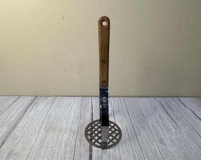 Vintage steel Marcrest potato masher with wooden handle