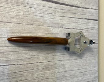 vintage tortoise shell Bakelite jar/can opener