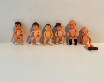 Vintage set of 8 miniature rubber, celluloid and plastic babies - 3 Shackman, 2 EDS Celluloid Germany Babies and 1 unmarked rubber baby