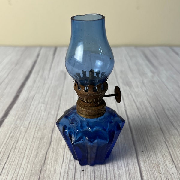 vintage diamond cut miniature blue glass oil lamp with blue chimney and wick