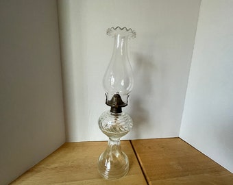 Vintage round swirl clear glass oil lamp with clear fluted chimney and wick