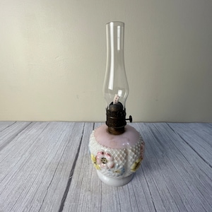Vintage medium diamond cut porcelain floral oil lamp with chimney and wick