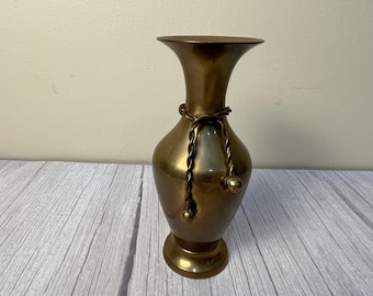 brass vase with rope around neck made in India
