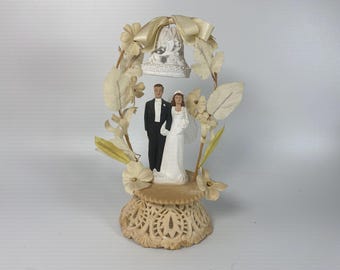 Vintage 1940s Chalkware Bride and Groom Cake Topper with Plaster Base, Bell and Faux fabric flowers
