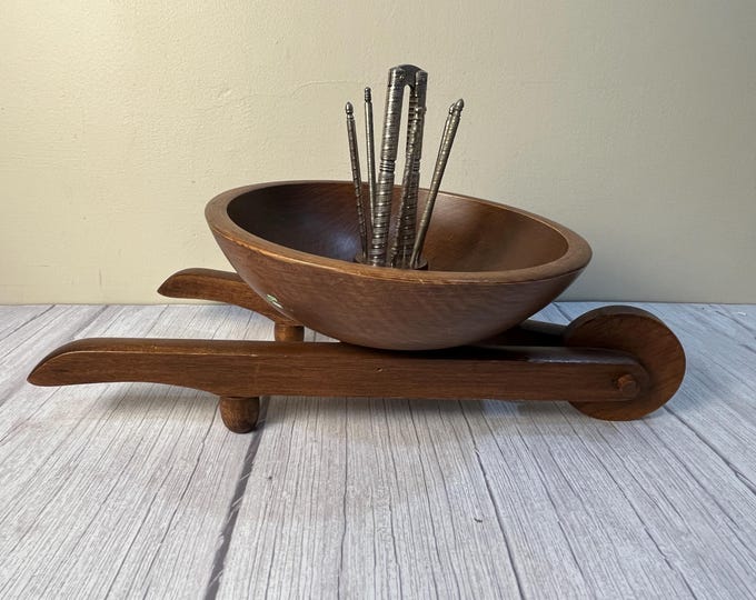 Vintage 8-piece wheel barrel shape nut bowl from Woodcroftery