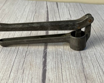 Vintage garlic press from Italy