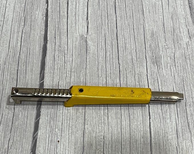 Vintage yellow handle Easy Twist jar opener