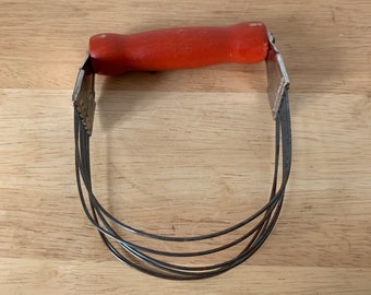 Vintage Androck wooden pastry cutter