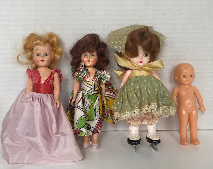 Set of 4 vintage small Plastic/ celluloid play dolls including S&E Doll, Plastic Holded Arts Co, Irwin and Another Sleepy Eye Doll