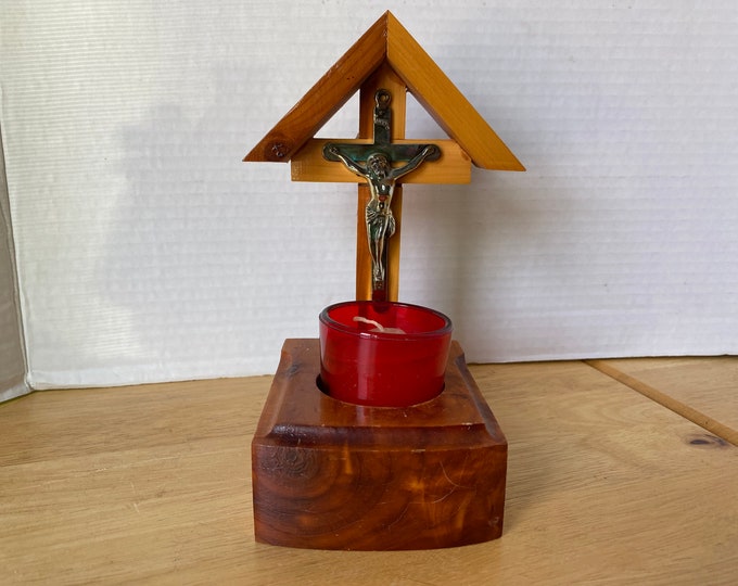 Wooden Shrine of Jesus on His Crucifixion Cross with devotion candle