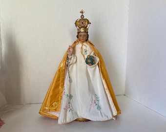 15 1/2" Tall Infant Jesus of Prague Chalkware Figurine w/vestment & vintage gold-tone baby pin  of a light blue Miraculous Medal charm.