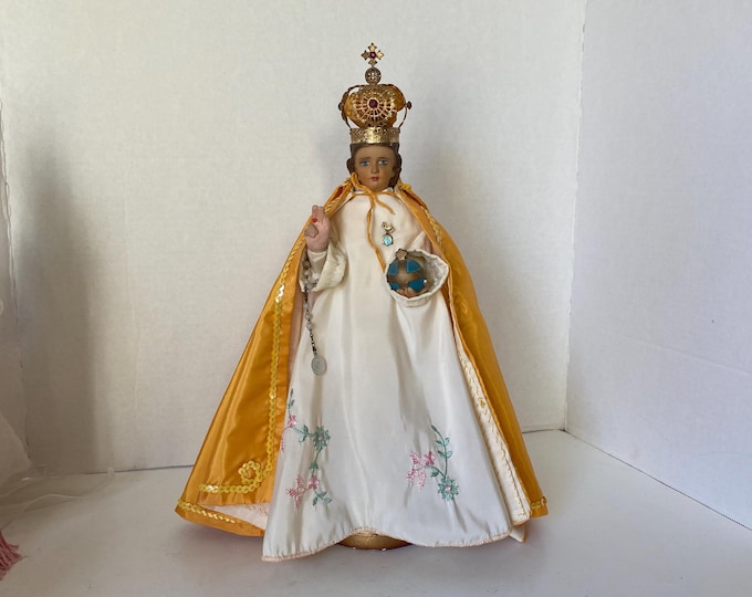 15 1/2" Tall Infant Jesus of Prague Chalkware Figurine w/vestment & vintage gold-tone baby pin  of a light blue Miraculous Medal charm.