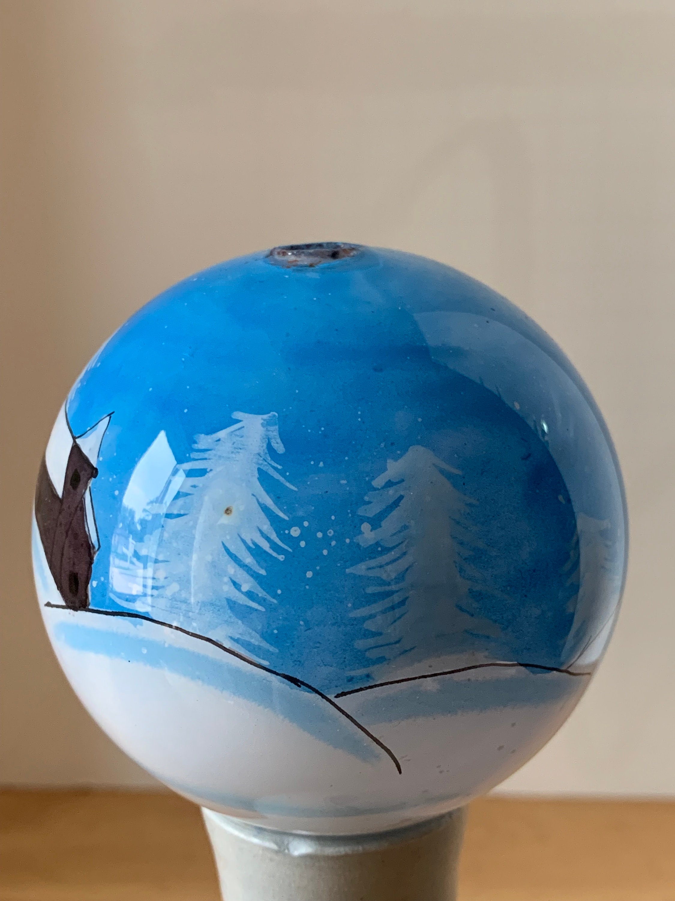 Li Bien inside painted christmas ornament