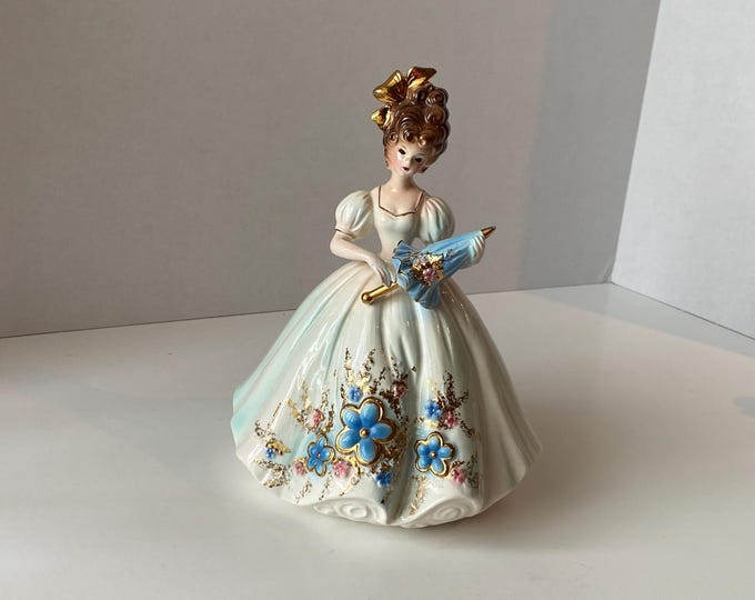 Vintage Josef Originals 8 3/4" Lady in Light Turquoise and white dress with big flowers accented in gold holding parasol