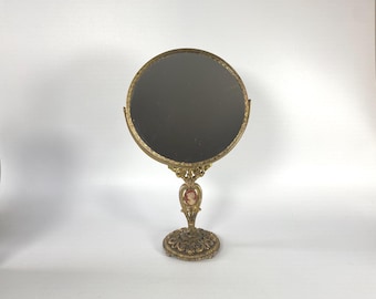 12 1/2"  Tabletop Vintage Brass Hollywood Regency Tilting Mirror with Cameo in Center of Base
