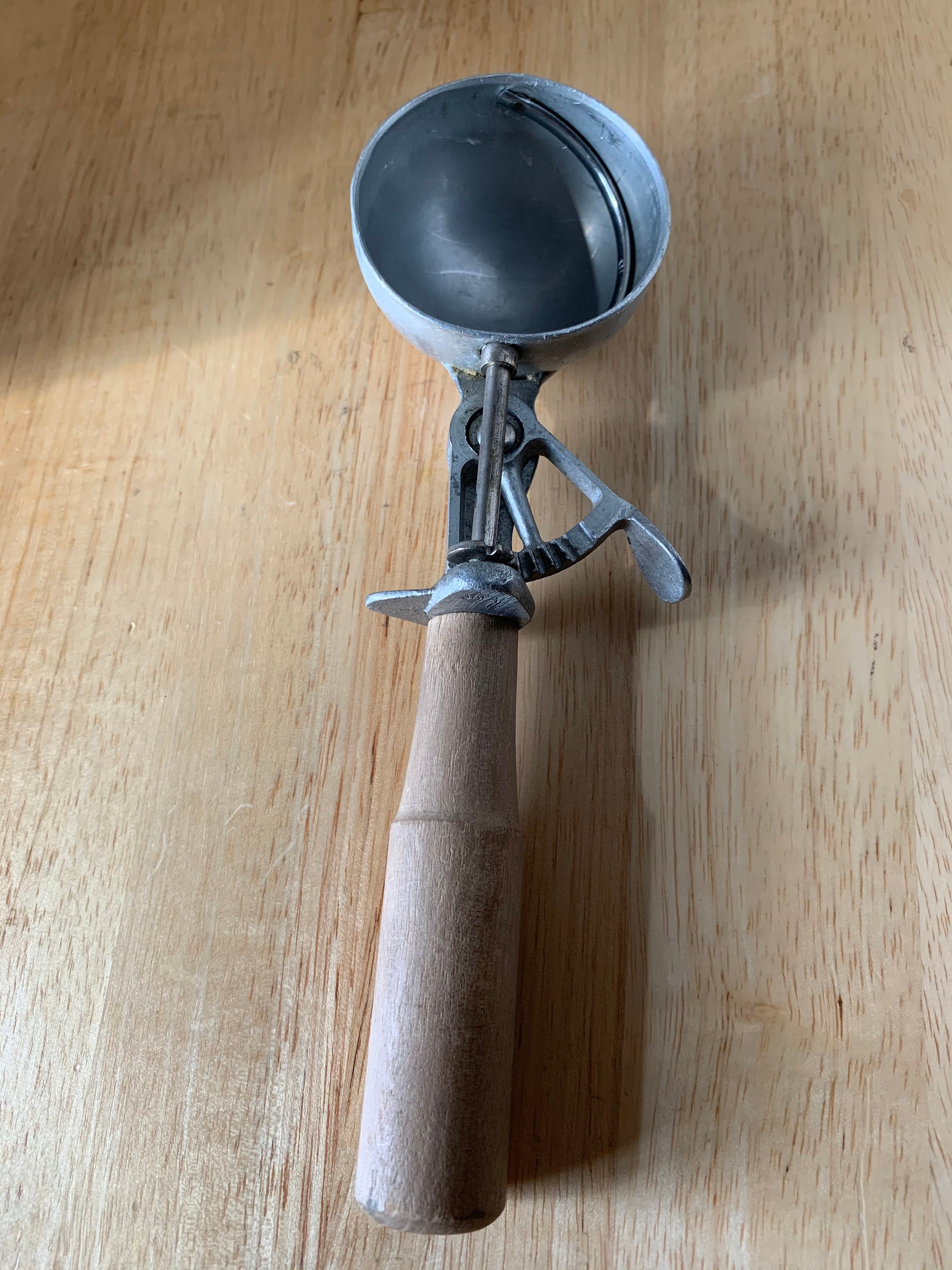 Vintage wooden handle aluminum gear ice cream scoop
