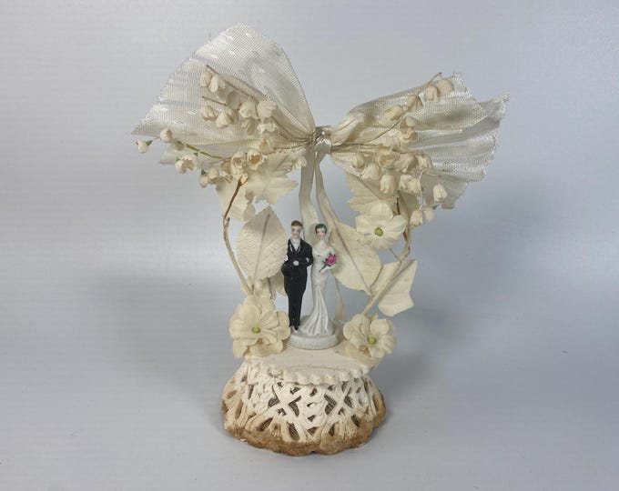 1930s Plaster and Ceramic Petite Bride and Groom Wedding Cake Topper with Large bow and Lily of the Valley Flowers