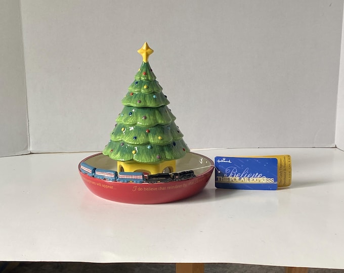Vintage Hallmark Cards Inc. Ceramic Porcelain Polar Express Tree Candy Dispenser With beautiful Christmas Message with original tag
