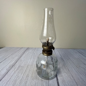 Vintage 16 sided clear glass bell shaped oil lamp with chimney and wick