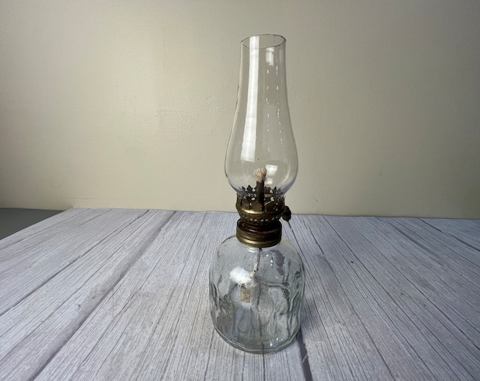 Vintage 16 sided clear glass bell shaped oil lamp with chimney and wick