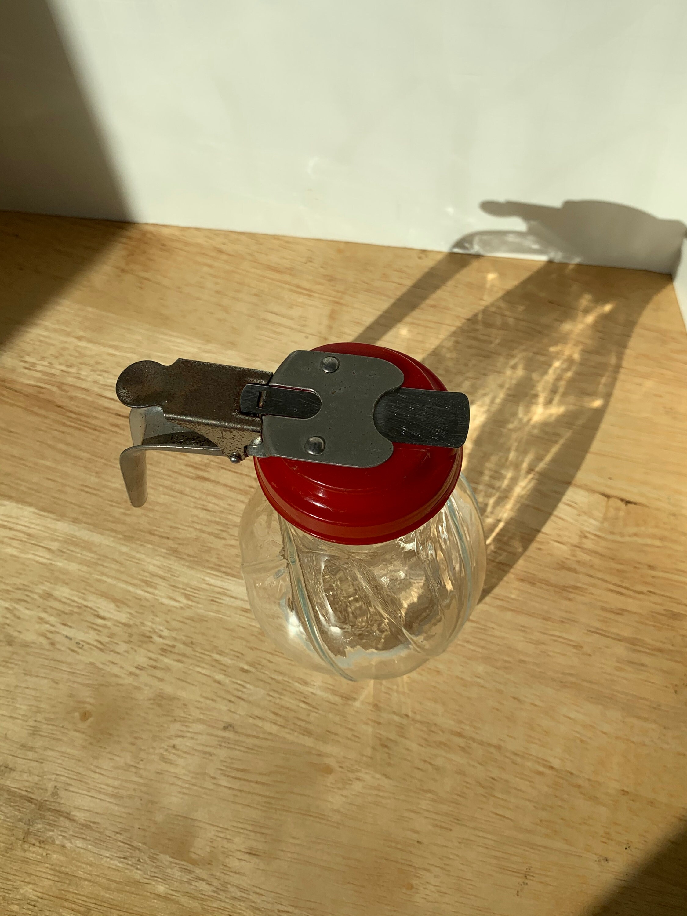 Vintage red top glass syrup dispenser