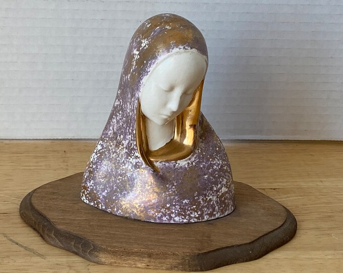 Vintage Madonna bust with gilded paint on wooden base