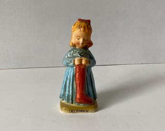 Vintage Ceramic December Birthday Girl Holding Christmas Stocking