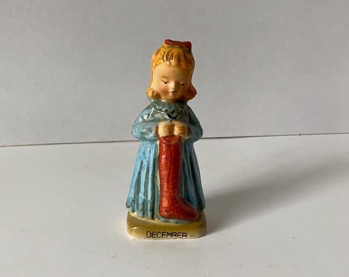 Vintage Ceramic December Birthday Girl Holding Christmas Stocking