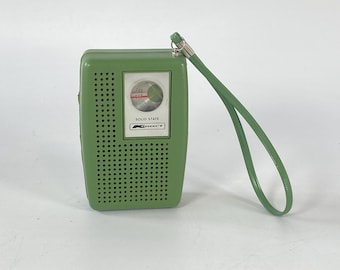 Working 1960s-1970s  Kmart Solid State AM Transistor Radio (Model W600) with matching wrist strap and a circular top tuner dial