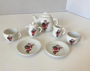 7 Piece 1987 set Shackman Vintage Children's Christmas Santa Claus Porcelain mini tea set including teapot, sugar, creamer, 2 cups 2 saucers