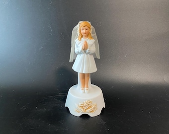 1985 Bisque Ceramic First Communion Girl Music Box with Real Netting Veil by Roman Inc. and plays the song, How Great Thou Art