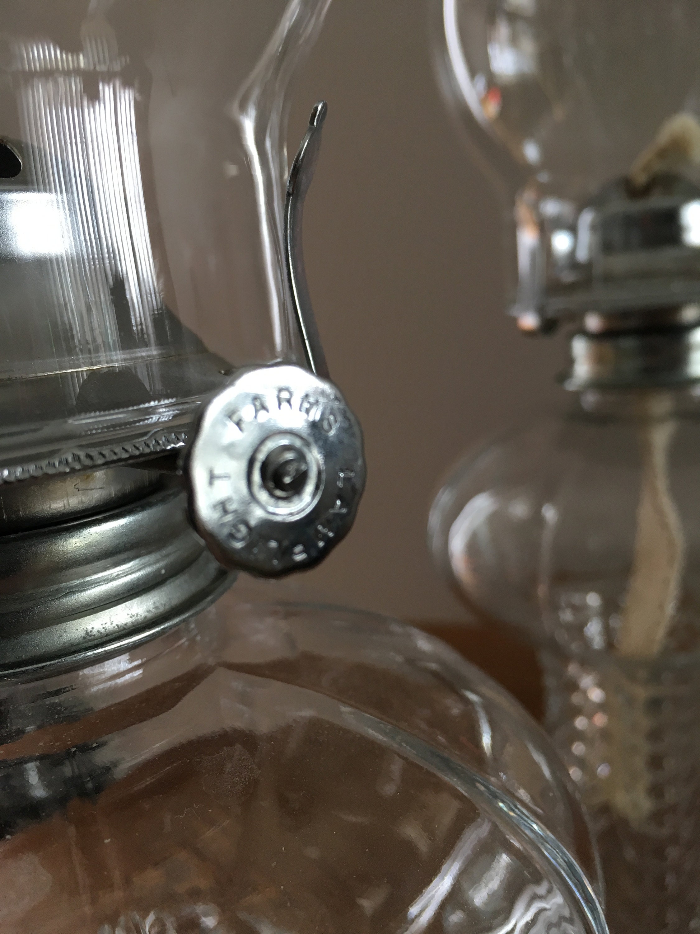 Vintage pair of Lamp Light Arms oil lamps with chimneys made in Austria