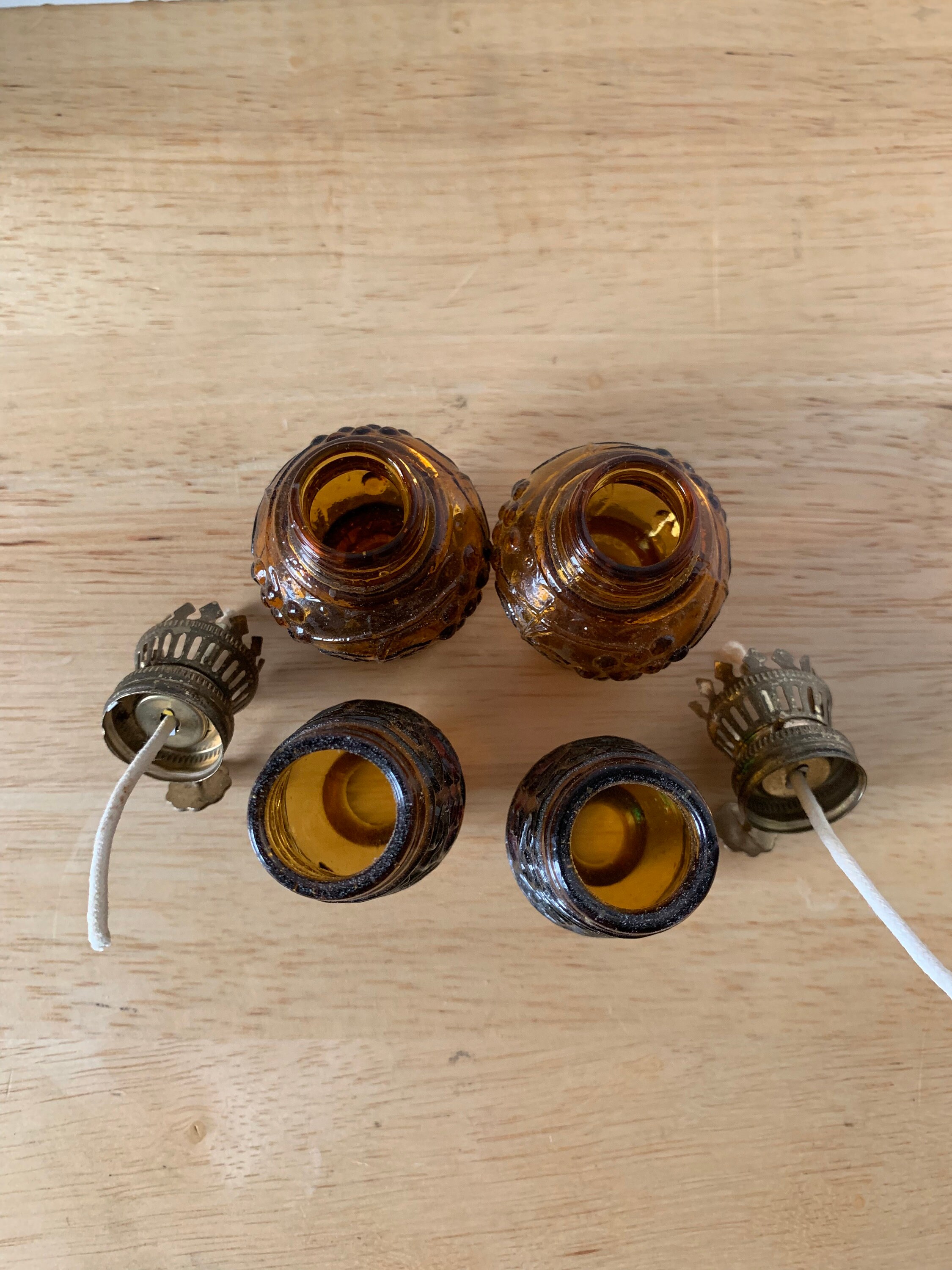 Vintage pair of brown glass oil lamps multi colored chimmneys with