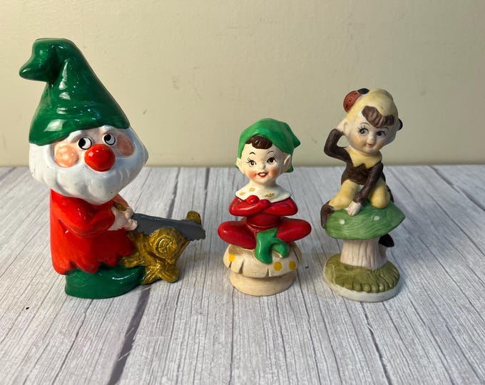 choice of 2 Pixie Elves on mushroom or Gnome cutting wood
