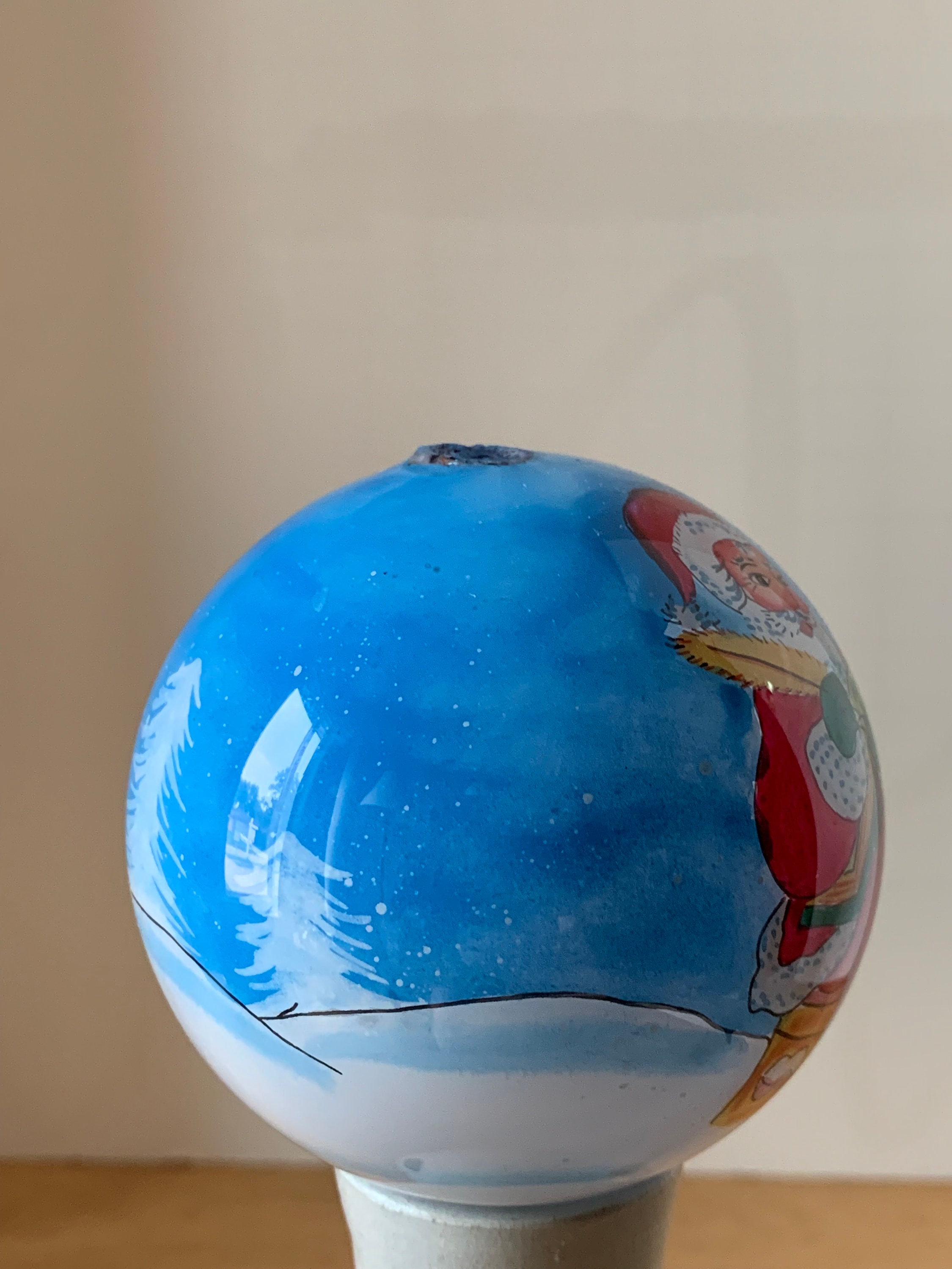 Li Bien inside painted christmas ornament