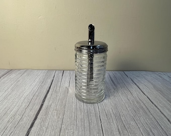 Ribbed glass sugar dispenser with spout for dispense