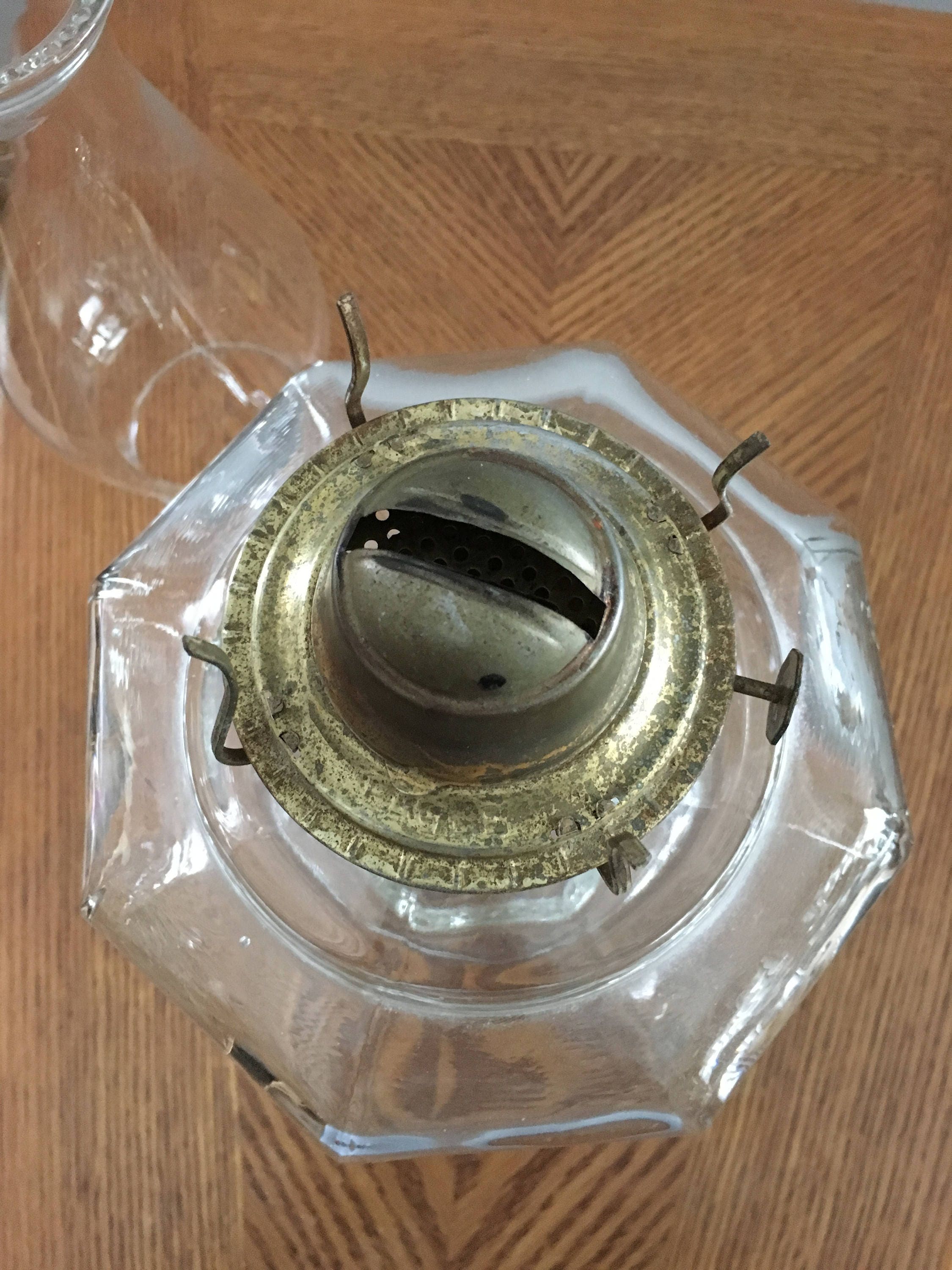 Vintage pair of oil lamps with chimneys