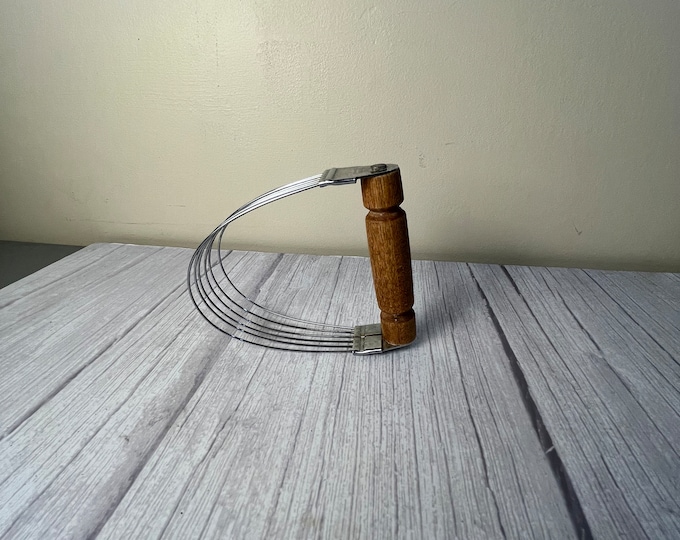 Vintage wood handle Bonny dough cutter