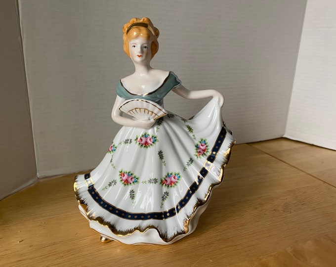 Vintage Fancy Lady Porcelain Ceramic Figurine 8 1/2" tall with gold gilded highlights